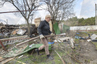 Charred houses, cratered lawns and an epic clean-up on road to Chernihiv