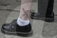 It symbolises resistance: Ukrainians get tattoos to back war effort