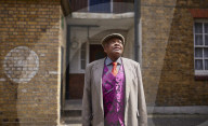 West Indian dominoes players dismayed by noise ban in London square.