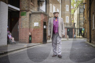 West Indian dominoes players dismayed by noise ban in London square.