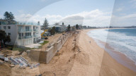 A 7m wall has gone up on a Sydney beach: are we destroying public space to save private property?
