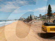 A 7m wall has gone up on a Sydney beach: are we destroying public space to save private property?