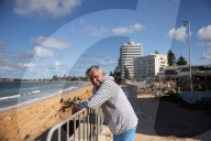 A 7m wall has gone up on a Sydney beach: are we destroying public space to save private property?