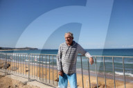 A 7m wall has gone up on a Sydney beach: are we destroying public space to save private property?