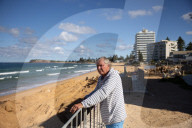 A 7m wall has gone up on a Sydney beach: are we destroying public space to save private property?