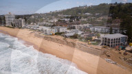 A 7m wall has gone up on a Sydney beach: are we destroying public space to save private property?