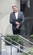 Gordon Ramsay looks dapper and shows off a fancy new platinum blonde hair do as he films scenes for his reality cooking show in Downtown Los Angeles over Memorial Day Weekend.