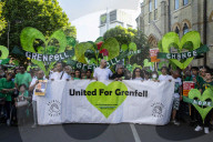 Grenfell Tower fire: fifth anniversary marked with silent march – in pictures