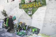 Grenfell Tower fire: fifth anniversary marked with silent march – in pictures