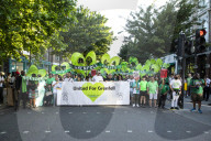 Grenfell Tower fire: fifth anniversary marked with silent march – in pictures