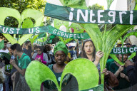 Grenfell Tower fire: fifth anniversary marked with silent march – in pictures