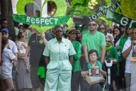 Grenfell Tower fire: fifth anniversary marked with silent march – in pictures