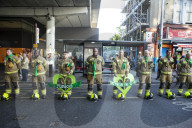 Grenfell Tower fire: fifth anniversary marked with silent march – in pictures