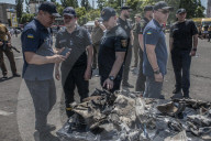Aftermath of shopping centre attack in Ukraine - in pictures