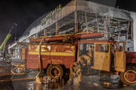 Aftermath of shopping centre attack in Ukraine - in pictures