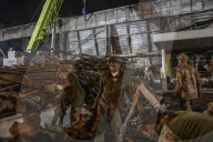 Aftermath of shopping centre attack in Ukraine - in pictures