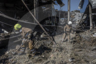 Aftermath of shopping centre attack in Ukraine - in pictures