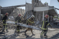 Aftermath of shopping centre attack in Ukraine - in pictures