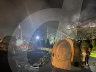 Aftermath of shopping centre attack in Ukraine - in pictures