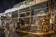 Aftermath of shopping centre attack in Ukraine - in pictures