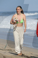 Scout Willis is seen strolling on the beach in Malibu with her musician boyfriend Jake Miller, her dog Grandma and friends on Monday afternoon. 
