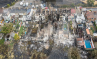 NEWS - Komplett vernichtet: Eine Wohnsiedlung in Wennington wurde ein Raub der Hitze-Flammen