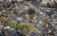 NEWS - Komplett vernichtet: Eine Wohnsiedlung in Wennington wurde ein Raub der Hitze-Flammen