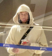 PREMIUM EXCLUSIVE Tyga Takes Flight At LAX After Being Slammed With Cultural Appropriation Claims