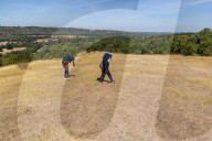 Heatwave returns for England as hosepipe ban nears.
