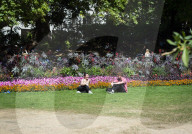 Warm weather during a heatwave as Londoners relax in Embankment Gardens, London
