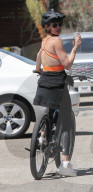 Simon Cowell, 62, and his fiancee Lauren Silverman, 45, are seen riding their bikes in Malibu with their son Eric, 8, and her son Adam Silverman, 16.