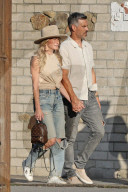 LeAnn Rimes looks happy and in love as she is taken to a fancy dinner in Malibu by husband Eddie Cibrian and her two stepsons a few days before she turns 40. 