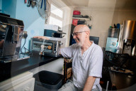 Portrait of inventor Philip Davies and his Artificial Intelligence powered toaster