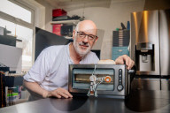 Portrait of inventor Philip Davies and his Artificial Intelligence powered toaster