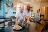 Portrait of inventor Philip Davies and his Artificial Intelligence powered toaster