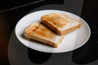 Portrait of inventor Philip Davies and his Artificial Intelligence powered toaster