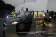 Crowds Greet Queen Elizabeth's Coffin