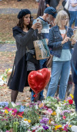 Mourners pay their respects and lay flowers in Green Park London
