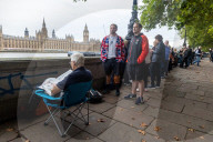Queues form on Lambeth Embankment to see the Queen lie in state at Westminster Palace 