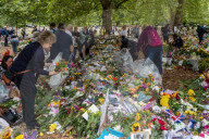Mourners pay their respects and lay flowers in Green Park London