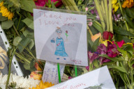 Mourners pay their respects and lay flowers in Green Park London