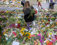 Mourners pay their respects and lay flowers in Green Park London