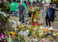 Mourners pay their respects and lay flowers in Green Park London