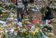 Mourners pay their respects and lay flowers in Green Park London