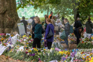 Mourners pay their respects and lay flowers in Green Park London