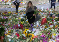 Mourners pay their respects and lay flowers in Green Park London