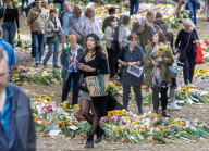Mourners pay their respects and lay flowers in Green Park London