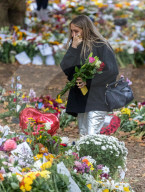 Mourners pay their respects and lay flowers in Green Park London