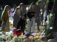 People mourning the death of the Queen