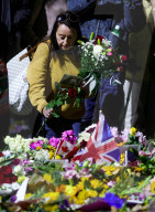 People mourning the death of the Queen